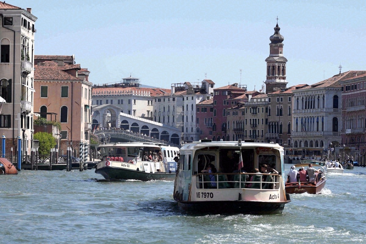 ACTV water buses on the Grand Canal at the Rialto Bridge